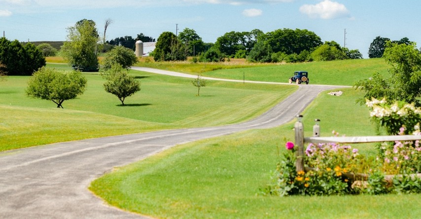 model-T car driving down country road, jrr tolkien mr. bliss