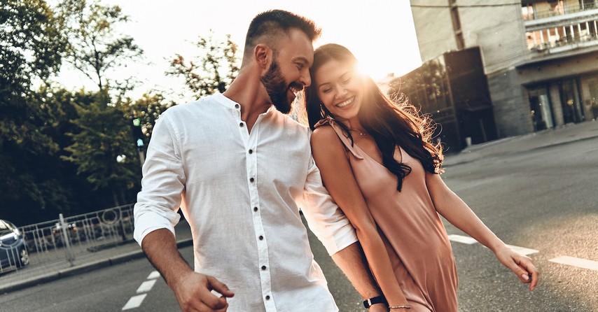 Happy young couple walking