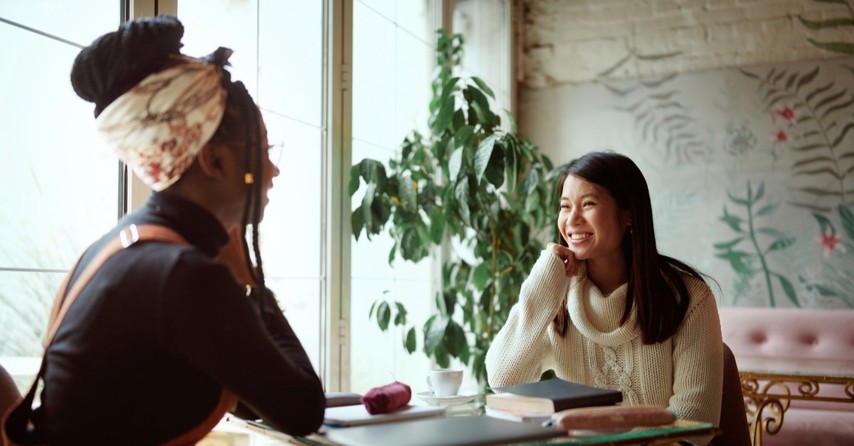 women talking in coffee shop