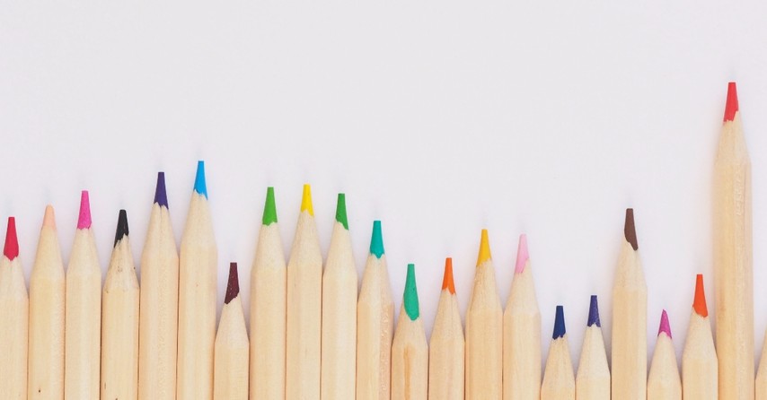 A row of different colored pencils