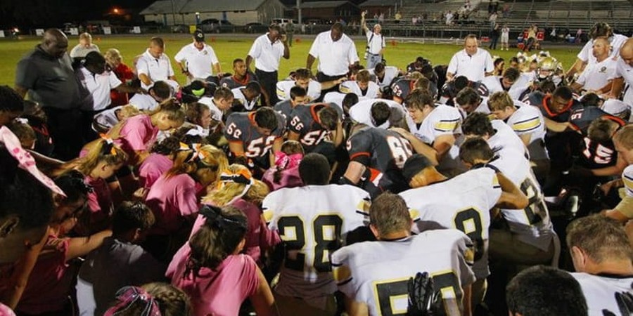 Georgia School District Forced to Pay Atheist Group $22,500 for Coach-Led Prayers