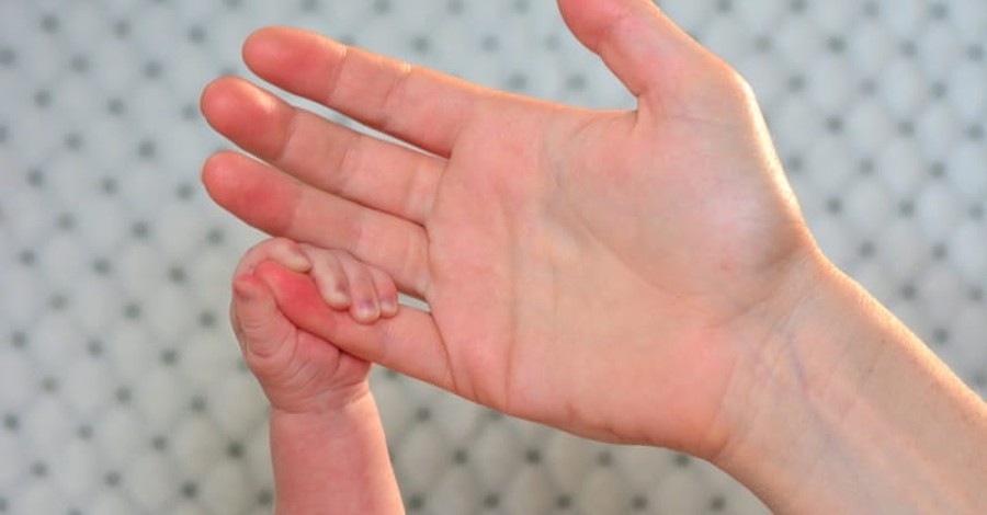 Nurse Shares Photo of 26-Week Preemie Baby Grabbing Her Hand