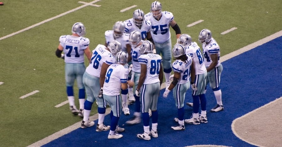 Three Dallas Cowboy Players Get Baptized in Viral Video