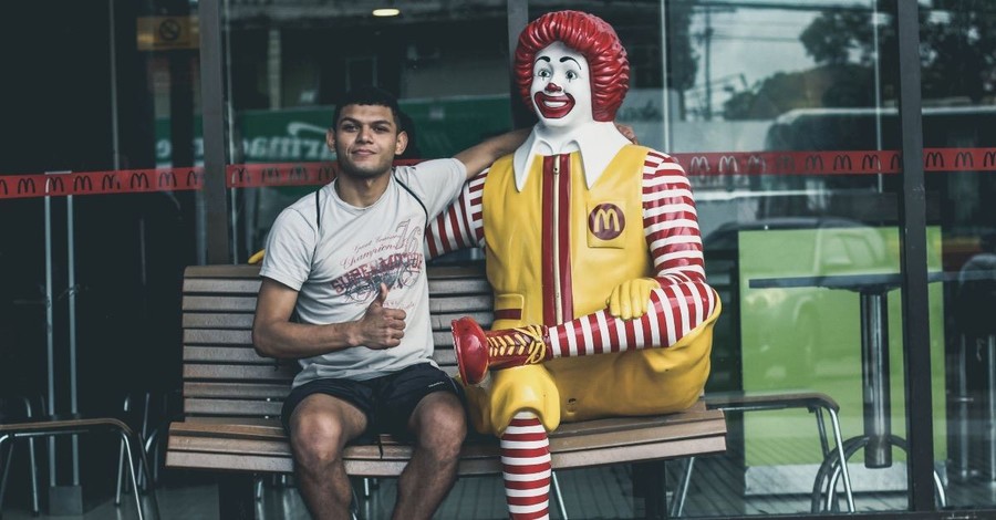 Ronald McDonald Depicted as 'McJesus' on a Cross