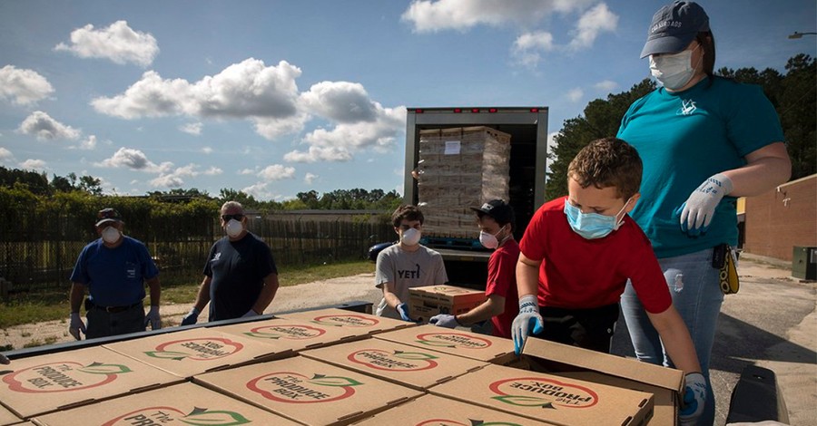 Trained in Rebuilding after Disasters, NC Baptists Now Distribute Food Boxes