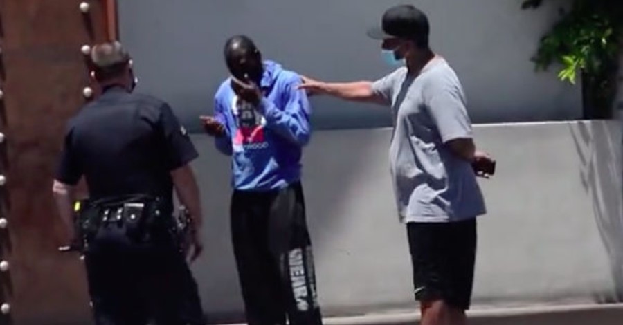 Denzel Washington helps a homeless man in Hollywood