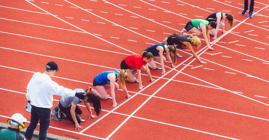 women running track, The DOJ backs an new Idaho law preventing transgender girls from competing alongside biological girls