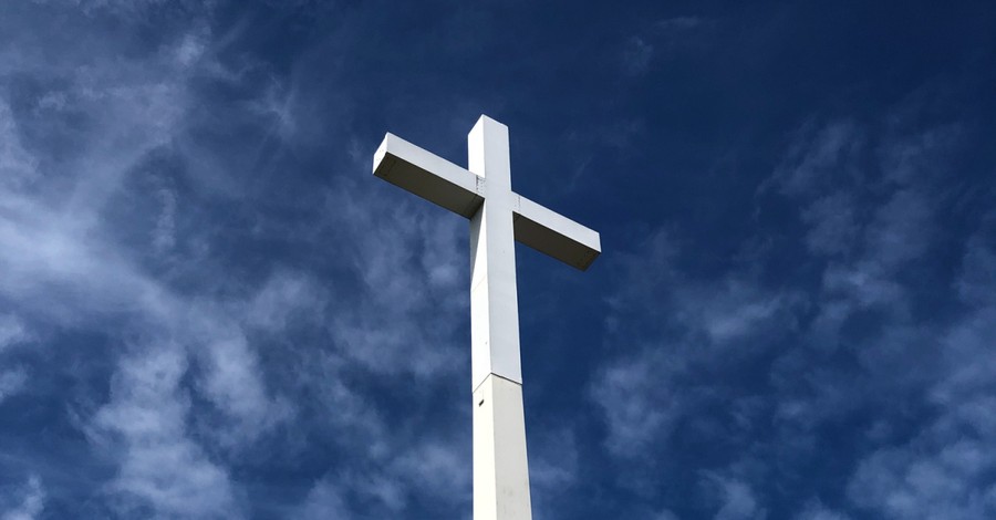 Students at Christian College Stand against Radical Protestors Who Want to Tear Down Cross