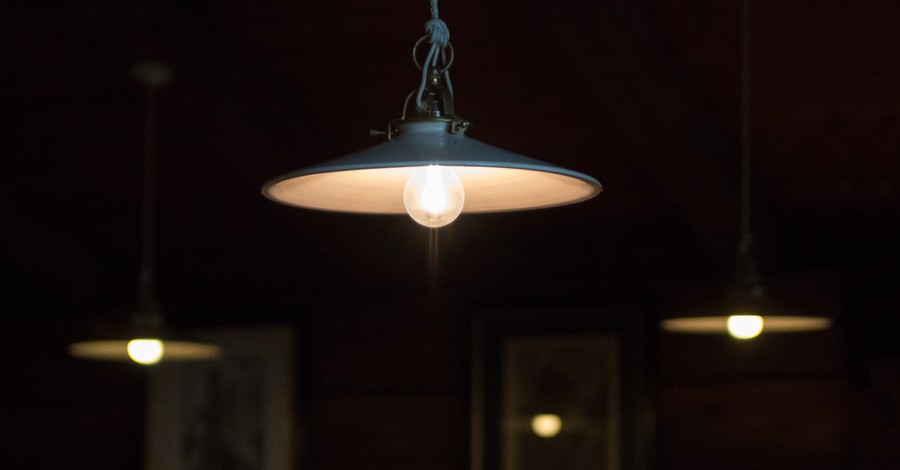 a hanging light, church raises over $100000 to help families in need pay off their electricity bills