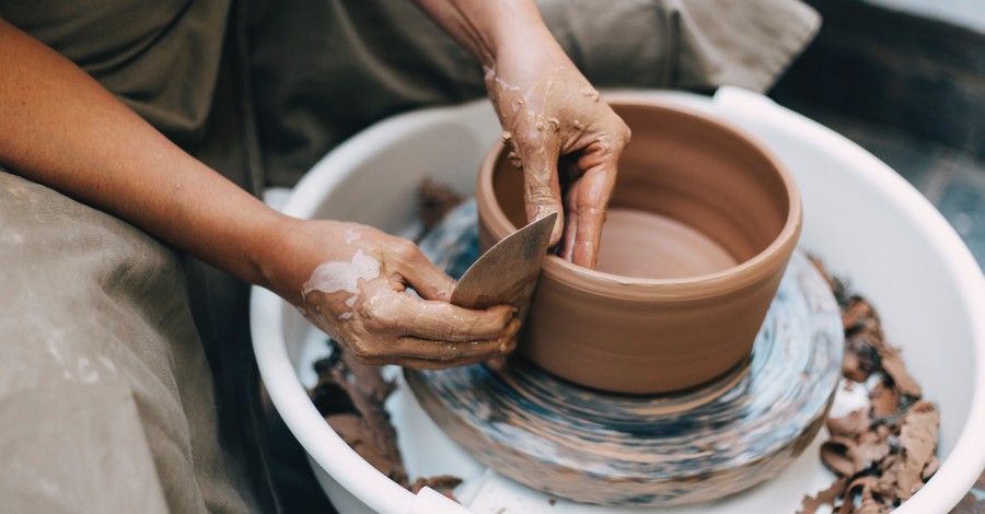 a potter throwing clay, join the Engage Art Contest