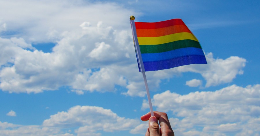 Christian University Grads Hand Pride Flags to Interim President during Commencement in Protest of School's LGBT Hiring Ban