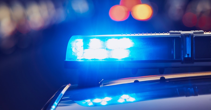 Police car lights, A pastor tackles a church gunman saving his congregants