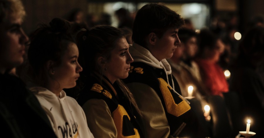 Students and parents attending a vigil following the school shooting in Oxford, Student kills three classmates and injures eight others in a school shooting