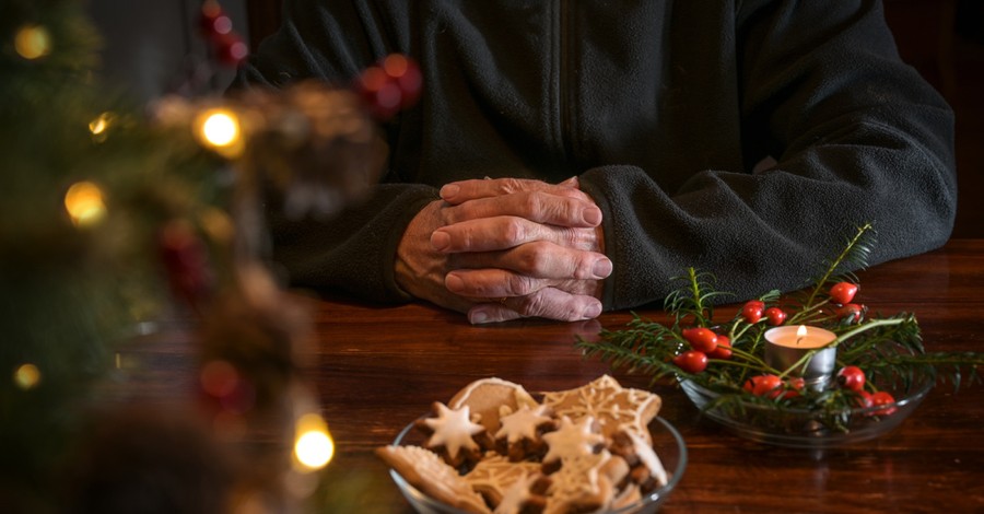 a man praying at Christmas, facing an impossible Christmas