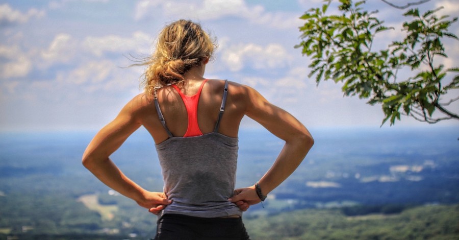 Woman athlete pausing to rest