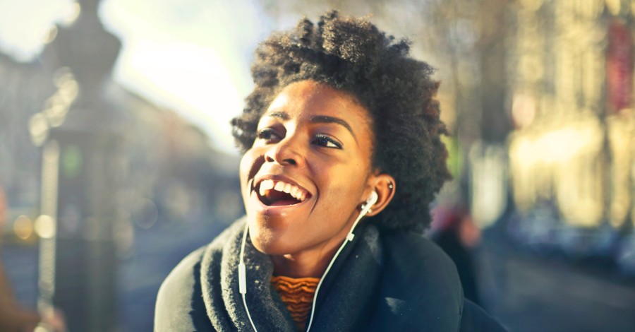 Woman listening to music in headphones