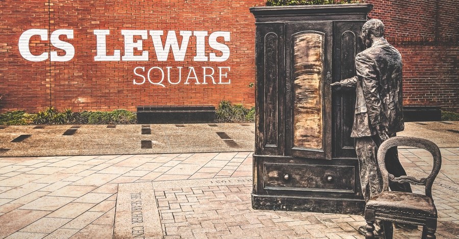 statue of cs lewis and wardrobe in CS Lewis Square Belfast