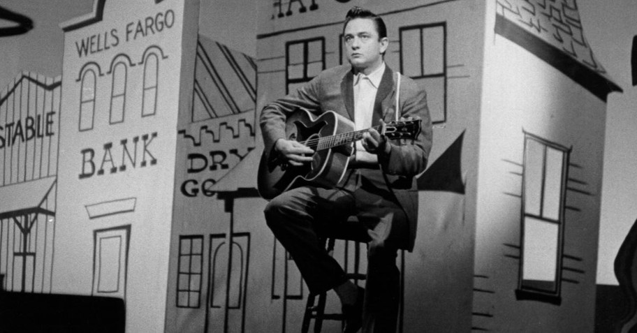 Johnny Cash performing on stage