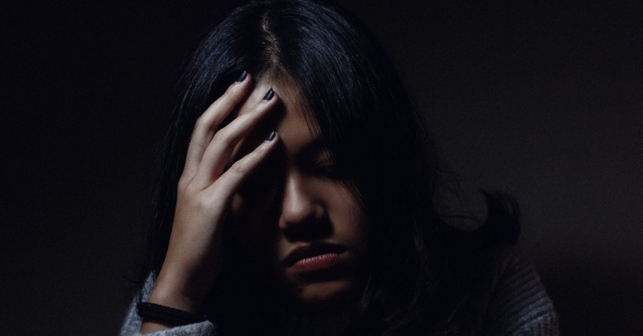 woman looking sad and stressed