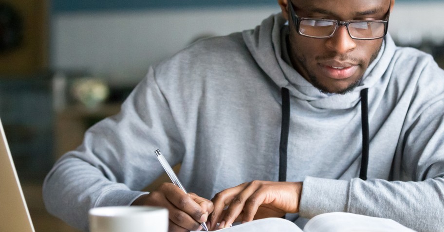 college student studying the Bible