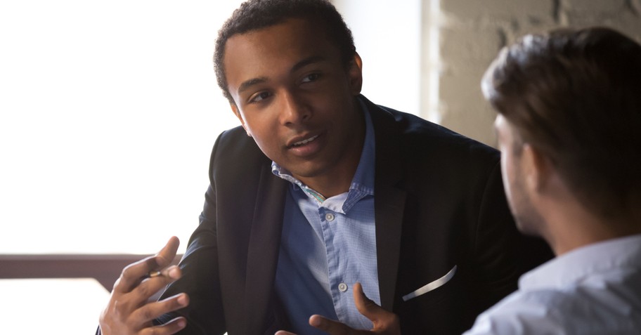 two men having a conversation racial reconciliation