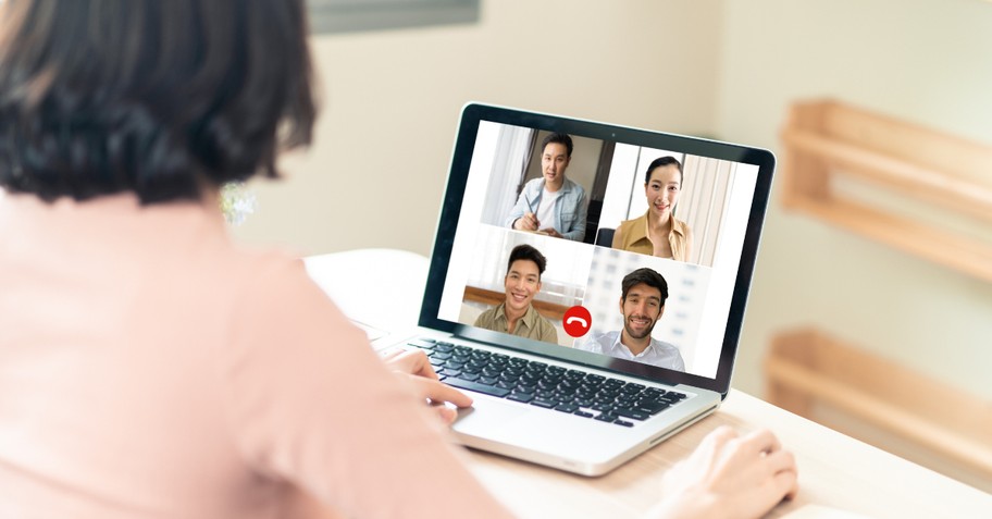 woman meeting with small group via laptop during coronavirus