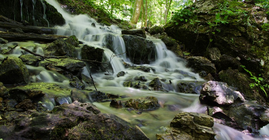 beautiful waterfall to signify river of giving