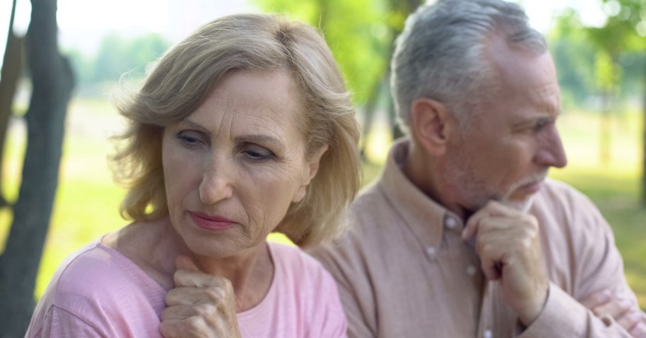 senior couple upset with each other after argument