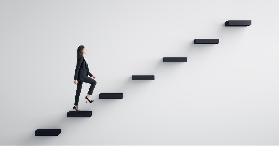 Woman climbing a series of stairs