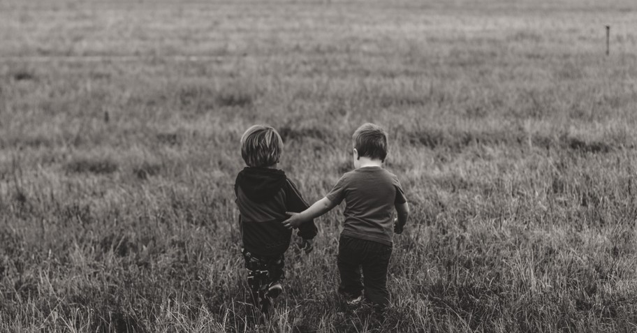 Two toddlers, Children's rights group condemns a judges decision to allow a gay throuple to be the legal parents are 2 kids