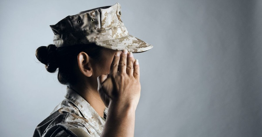 Female soldier saluting