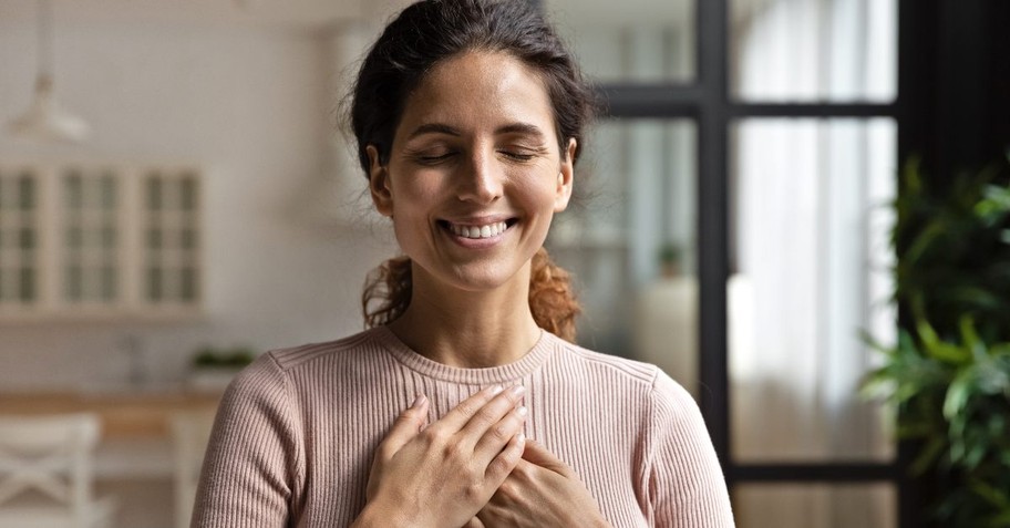 Woman praying in humility