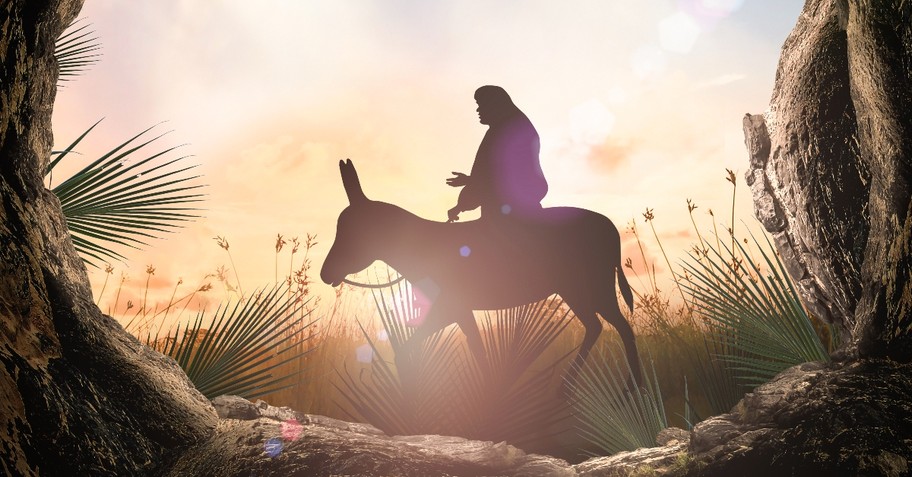 Illustration of Jesus riding on a donkey surrounded by palms