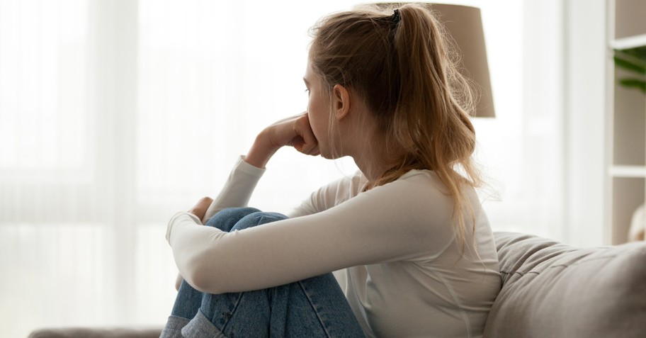 Sad woman sitting alone