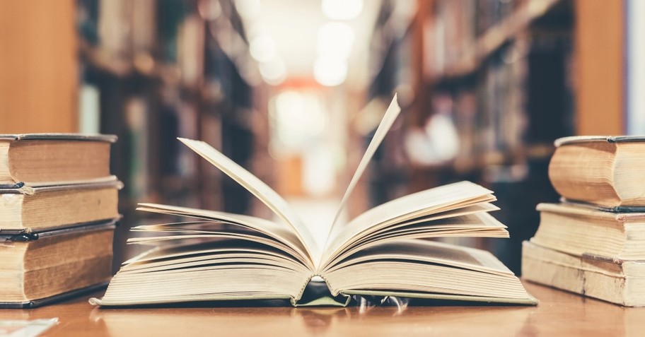 open books in library hall