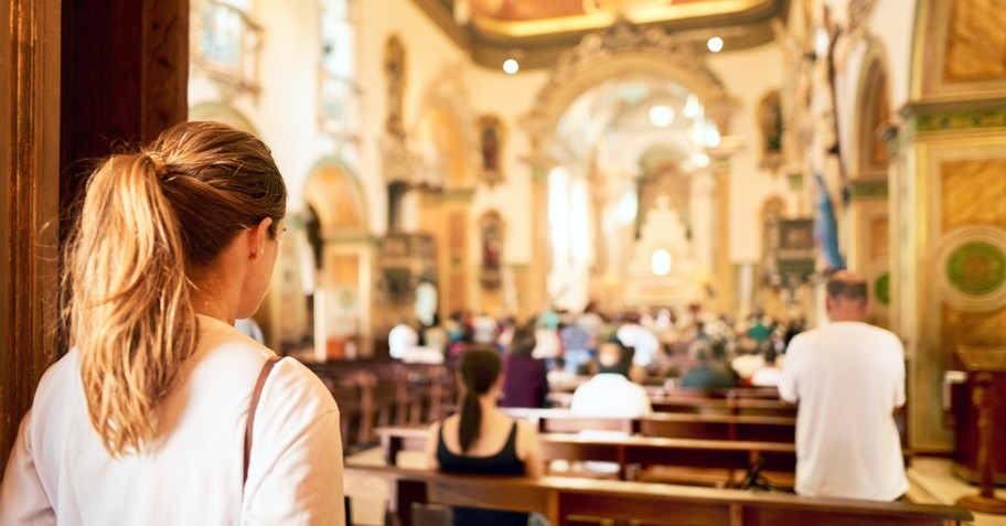 Woman entering a church