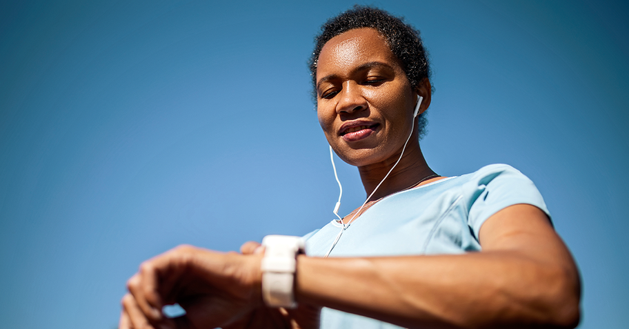 smiling-woman-checking-heart-rate-after-workout-gettyimages-Zorica Nastasic