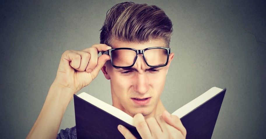 man looking confused as he reads bible, spiritual narcissist