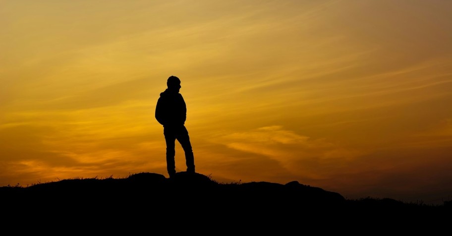 man standing on hill, christian love quotes