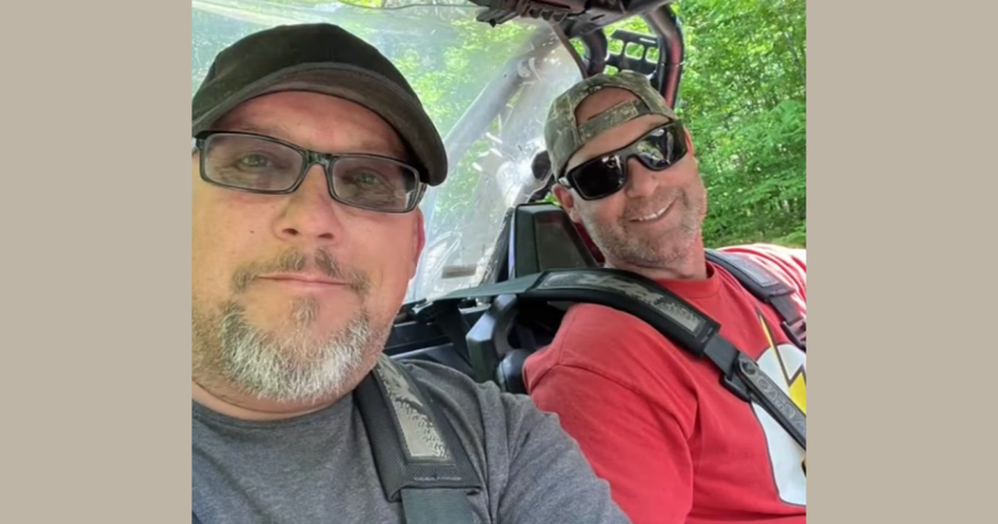 two men in the woods