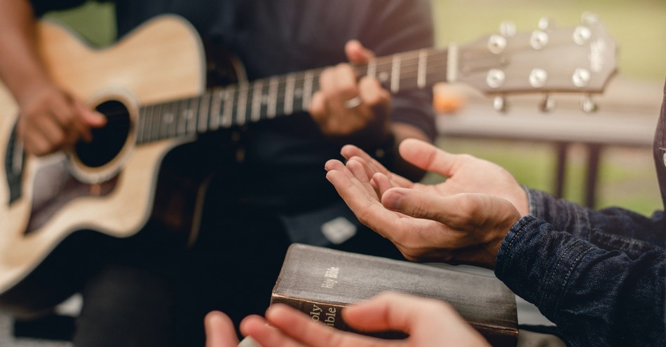 Why Do We Raise Our Hands in Worship?