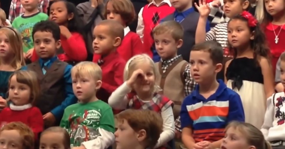 Little Girl with Deaf Parents Signs for Them during Christmas Concert