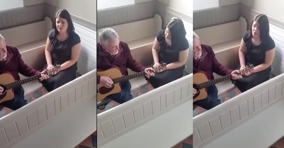 Father And Daughter Sing Irish Folk Song In Empty Chapel