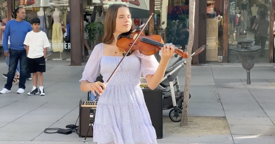 Toddler Steals The Show As Street Violinist Plays ‘Total Eclipse Of The Heart’