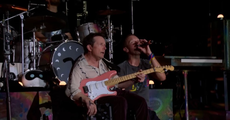 Michael J Fox Appearance on Stage at Coldplay Concert Surprises and Inspires Many