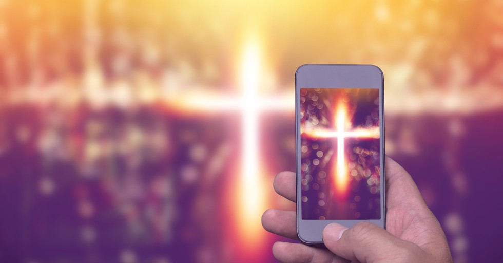 cross image on smartphone social media faith,  impact of technology on christian living and worship