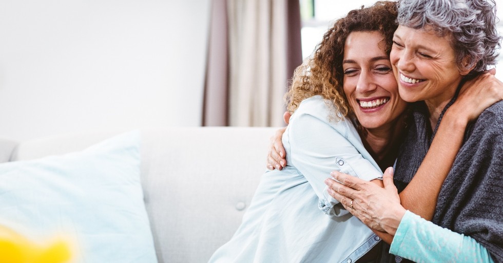 adult daughter hugging senior mom laughing and happy, prayers of intercession for adult children
